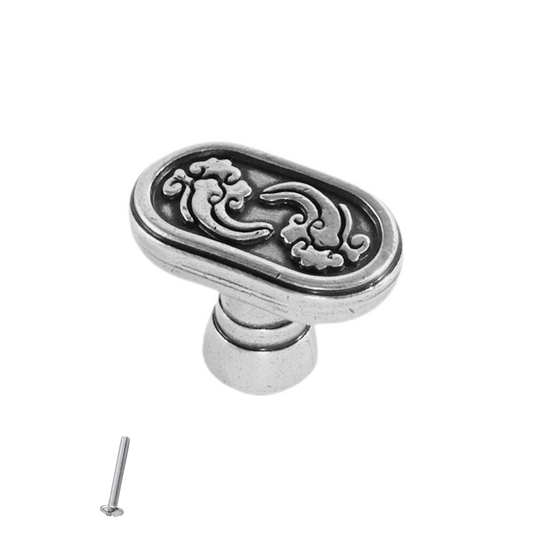 Starý kovový knoflík na skříň - tvar kapsle - 34 mm x 20 mm - starožitně stříbrný – Furnica