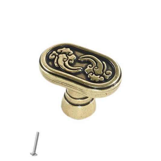 Starý kovový knoflík na skříň - tvar kapsle - 34 mm x 20 mm - starožitná mosaz – Furnica
